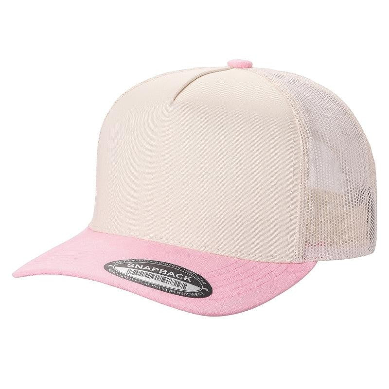 Waycap 9FORTY trucker hat with a beige crown, pink suede bill, and white mesh back. Features adjustable snapback closure.