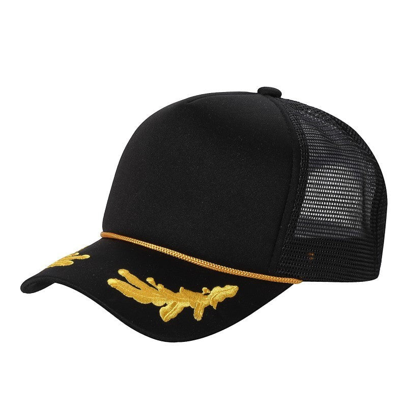 Waycap Sponge trucker hat in black with gold embroidery on the brim and mesh back. Adjustable snapback closure.
