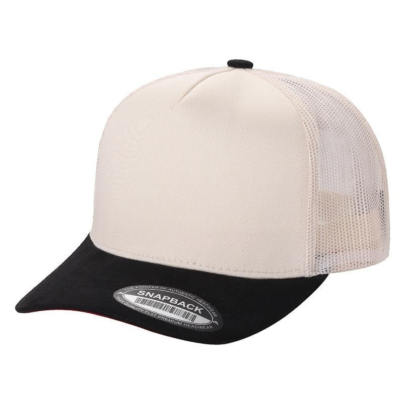 Waycap Mesh trucker hat with a cream front panel and black suede bill. Features a breathable mesh back and adjustable snapback closure.